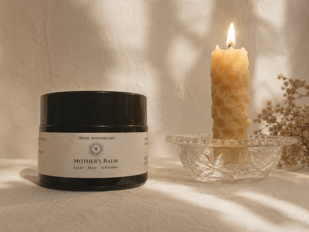 Hedd Mother's Balm paired with a beeswax candle