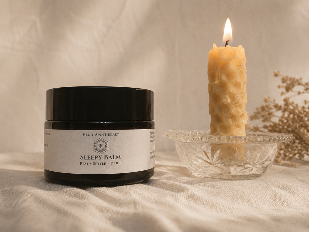 Hedd Apothecary sleepy balm paired with a beeswax candle